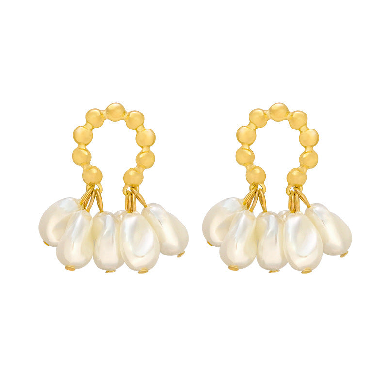Bonnie baroque pearl earrings on a white background