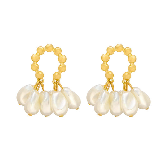 Bonnie baroque pearl earrings on a white background