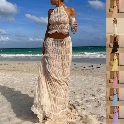 Marlowe shirred halter top and long skirt set in cream, worn on the beach, with the other colourways shown alongside - Lia Dora