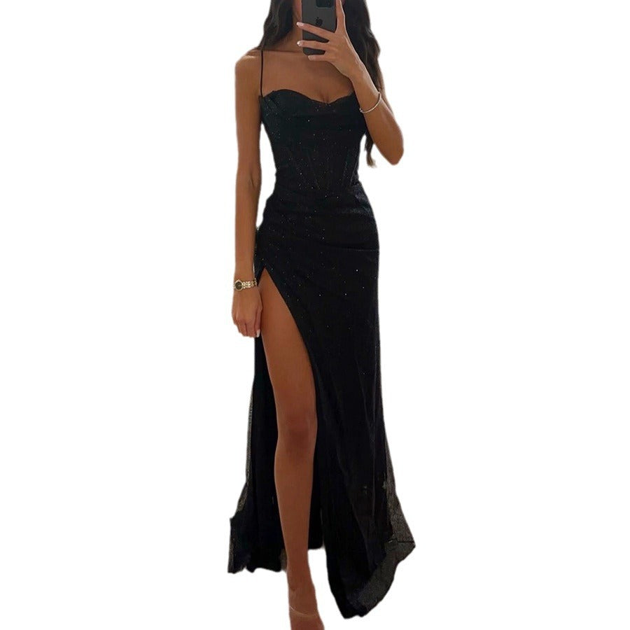 Sylvie split slip maxi dress in black, front view with the high split, on a white background