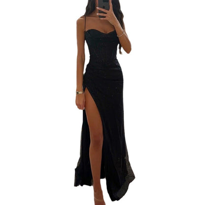 Sylvie split slip maxi dress in black, front view with the high split, on a white background