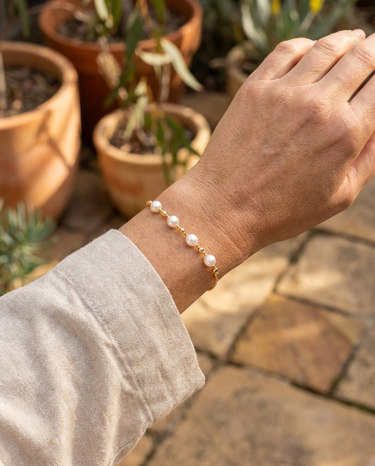 Freya Elastic Memory Bracelet, Four Pearl, worn - Lia Dora