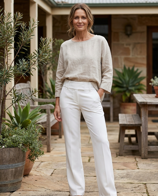 Rosa straight-leg tailored trousers in white, worn - Lia Dora