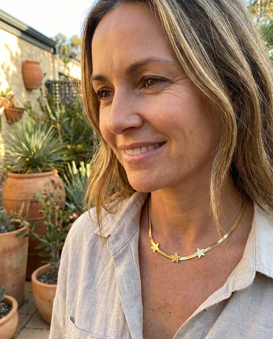 Luna Stainless Star Choker in gold, worn - Lia Dora