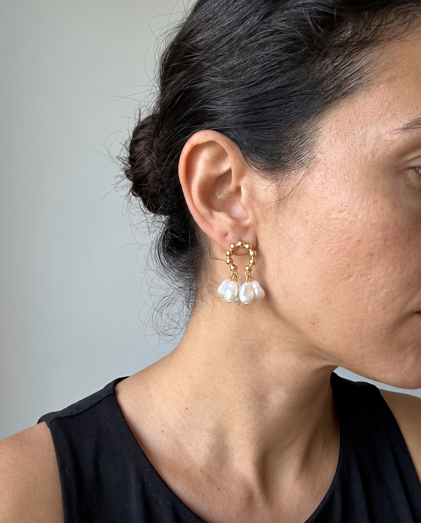Bonnie baroque pearl earrings worn with an updo