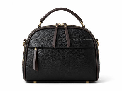 Juno top handle crossbody bag in Black